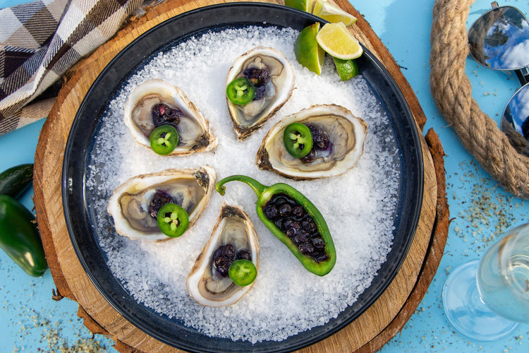 Huîtres et mignonette jalapeño & bleuets